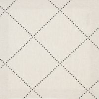 Huddleson natural linen napkin with black check diamond moroccan print